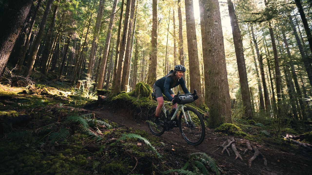 woman descending on a Canyon Grizl gravel bike