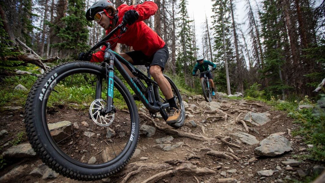 Cross country mountain bikes are designed for efficiency and speed, making them ideal for navigating diverse terrains with agility and precision.