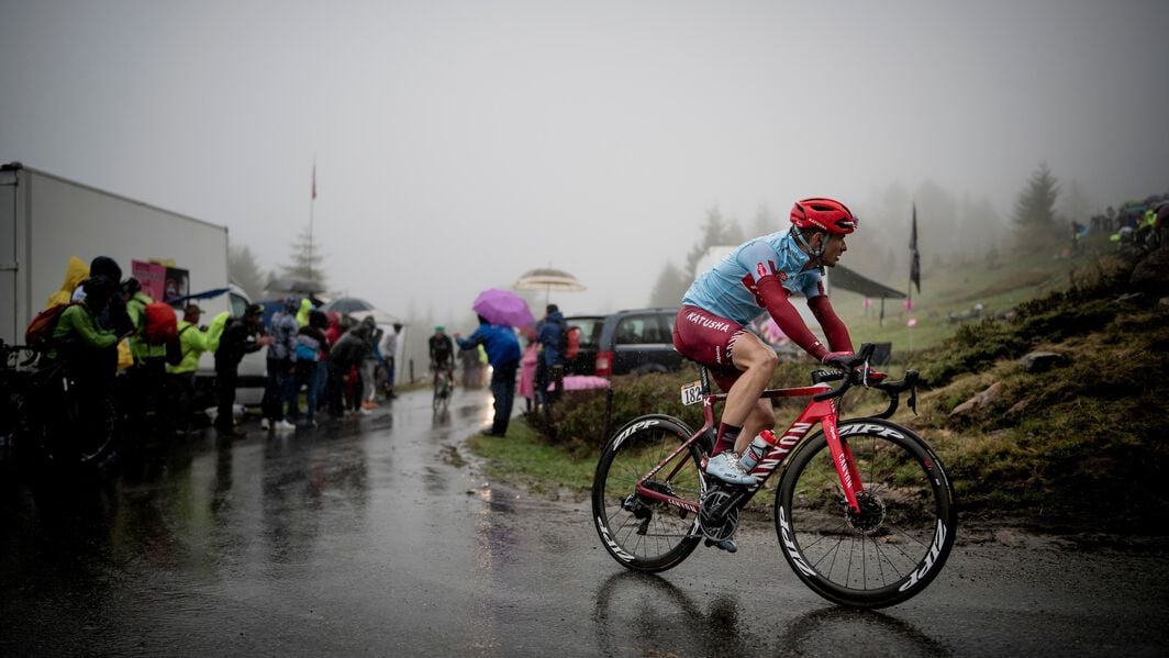 Enrico Battaglin (Katusha-Alpecin) up the extremely wet Mortirolo during the 2019 Giro